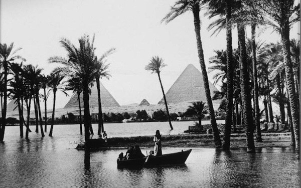 The pyramids of Giza at a time of high flooding an